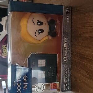 Doctor Who Thirteenth Doctor and Tardis.